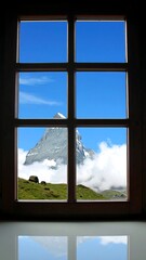 Mountain view through a wooden window
