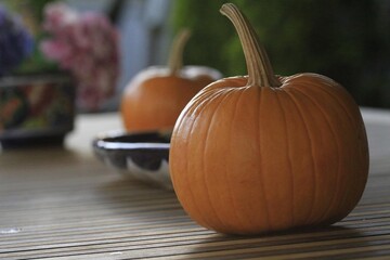 pumpkin on a wooden table