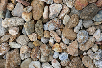Small rocks and stones close-up abstract textured background