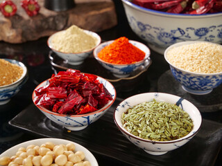 Traditional Chinese Spices and Seasonings in Porcelain Bowls for Asian Cooking and Barbecue