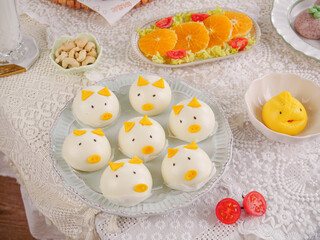 Cute Cat-Shaped Steamed Buns and Fresh Fruit Breakfast Table Setting