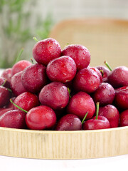 Fresh Red Cherries with Water Drops in Wooden Bowl - Healthy Summer Fruit