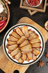 Wood Smoked Farmhouse Bacon Slices on Rustic Kitchen Table with Traditional Cooking Ingredients