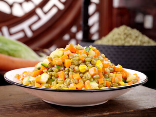 Stir-Fried Green Barley Kernels with Vegetables - Healthy Whole Grain Dish on White Plate