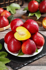 Fresh Red Nectarines with Yellow Skin on White Plate - Healthy Summer Stone Fruit