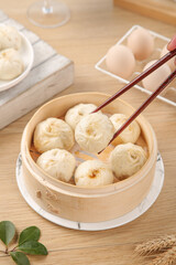 Fresh Xiao Long Bao Chinese Dumplings in Bamboo Steamer Traditional Breakfast Dim Sum