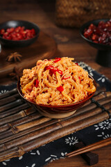 Spicy Red Shredded Tripe with Oil - Traditional Asian Cuisine Dish on Bamboo Mat