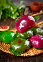 Traditional Chinese Dim Sum Dumplings in Bamboo Steamer with Chopsticks