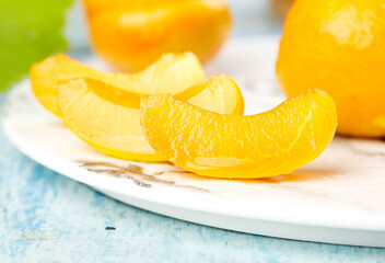 Fresh Orange Slices on White Plate - Natural Citrus Fruit Segments Ready to Eat
