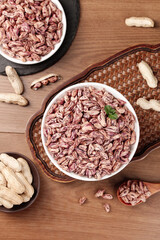 Colorful Striped Beans and Peanuts in Bowls on Wooden Background - Fresh Homegrown Farmers Market Produce