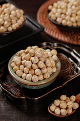 Fried Five Spice Chickpeas in Wooden Bowls - Traditional Xinjiang Crispy Beans Snack with Salt Seasoning