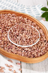 Colorful Striped Peanuts Kernels in Wooden Bowl Healthy Natural Food Agriculture Concept