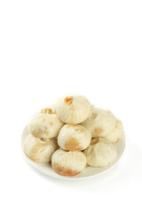 Traditional Shengzhou Xiaolongbao Chinese Soup Dumplings on White Plate - Fresh Steamed Dim Sum