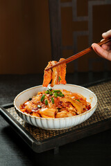 Spicy Chinese Beef Tripe with Red Chili Oil and Shredded Meat in Traditional Bowl