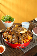 Braised Lamb Stew with Vegetables in Traditional Red Pot - Asian Style Comfort Food