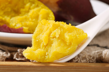 Fresh Yellow Sweet Potato on Spoon - Cooked Root Vegetable Close-Up