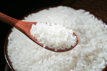 White Long Grain Rice in Wooden Spoon - Agricultural Food Product