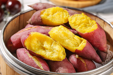 Fresh Steamed Sweet Potatoes with Golden Flesh in Bamboo Steamer