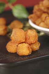 Dried Longan Fruit from Putian China Traditional Asian Snack on Slate Plate