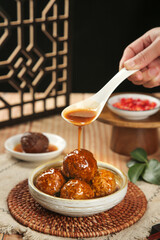 Chinese Braised Lion's Head Meatballs with Sauce Drizzle - Traditional Asian Banquet Dish
