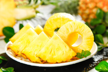 Fresh Sweet Pineapple Slices on White Plate - Tropical Fruit Ready to Eat