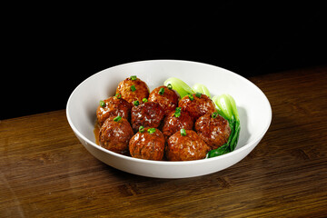 Chinese Lion's Head Meatballs Braised Specialty Dish with Bok Choy in White Bowl