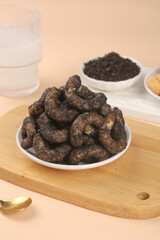 Chocolate Covered Cashews and Nuts on Wooden Board - Premium Gourmet Snacks to Satisfy Your Cravings