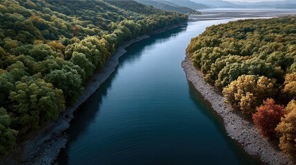 Aerial view river forest mountain landscape autumn water nature tranquil scenic outdoor. Serene river winding through lush forest and mountain