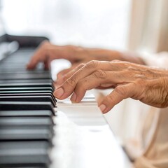 Obraz premium Close-up of elderly hands playing a piano (2)