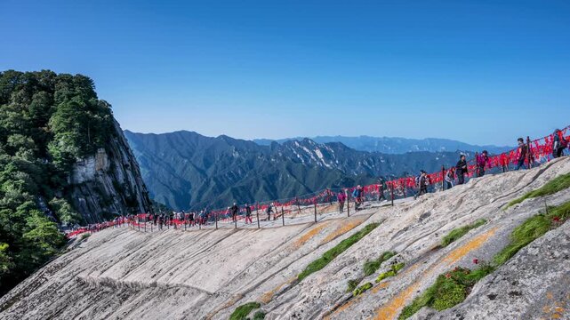 time lapse video of the tourists on green dragon ridge of Huashan mountain, Shaanxi province, China
