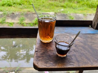 close up of coffee and sweet tea drinks on the table