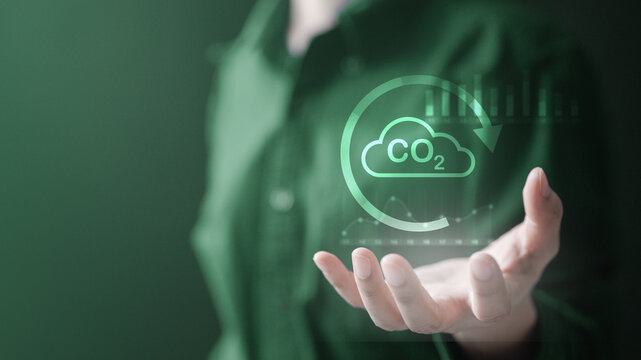 carbon, footprint, tracker, co2, sustainability, eco, environment, reduce, emissions, climate, Hand holding CO2 cloud icon, representing carbon footprint reduction and sustainability efforts.