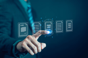 Digital document management concept with businessman selecting virtual file on futuristic interface, representing paperless office, workflow automation, data storage, and electronic record system.