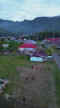 Children Playing Soccer in a Rural Village