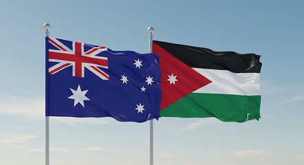 Australian and jordanian flags waving against a clear blue sky