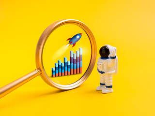Creative concept of business startup growth with magnifying glass focusing on rocket and rising bar chart, astronaut figure looking at progress. Symbol of innovation, content strategy, creative idea.