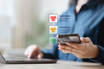 Hands holding smartphone with product icons and price comparison app interface, representing ecommerce shopping deals, online retail marketplace, digital savings, and consumer purchase analytics.