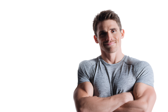 Muscular man with short brown hair and a beard, wearing a grey tshirt, with arms crossed and a slight smile, isolated on transparent background