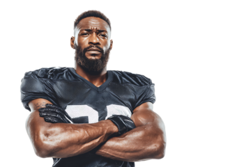 A muscular african american football player with a beard, wearing a black jersey with the number 55, stands with his arms crossed, isolated on a transparent background