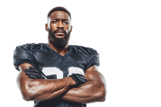 A muscular african american football player with a beard, wearing a black jersey with the number 55, stands with his arms crossed, isolated on a transparent background