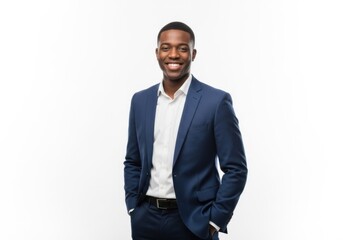 Fototapeta premium Smiling young african american businessman in a blue suit isolated on white background