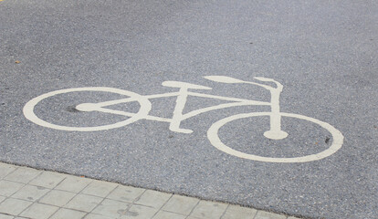 Symbols of bicycle parking signs or bicycle routes.