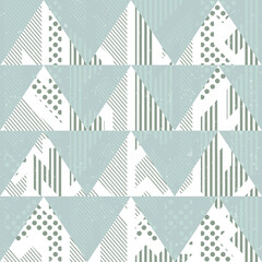 Vintage blue triangles. Seamless pattern with grunge effect