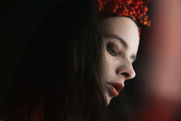 Mystical Portrait of Pale-Skinned Woman with Black Hair and Rowan Berry Wreath, Ethereal Dark Folklore Atmosphere