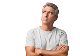 Fototapeta premium Pensive mature man looking upwards with arms crossed isolated portrait png image for design projects isolated on transparent background