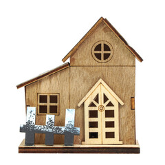Small decorative wooden house model with pitched roofs isolated on transparent background detailed windows, door, and rustic fence. Ideal for home decor, woodworking, and miniature craft themes.