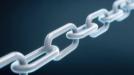 Obraz premium Close-up view of shiny metal chains against a dark background.