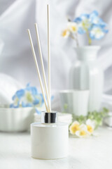 Aromatic scent of reed diffuser white glass bottle.