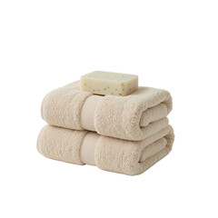 Soft luxury with stacked towels and soap for spa relaxation and personal care