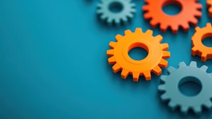 Orange and blue gear wheels representing business connection, teamwork, engineering, mechanism, and essential processes